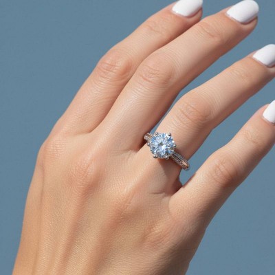 Round Cut Six Claw Moissanite Ring with Side Diamonds